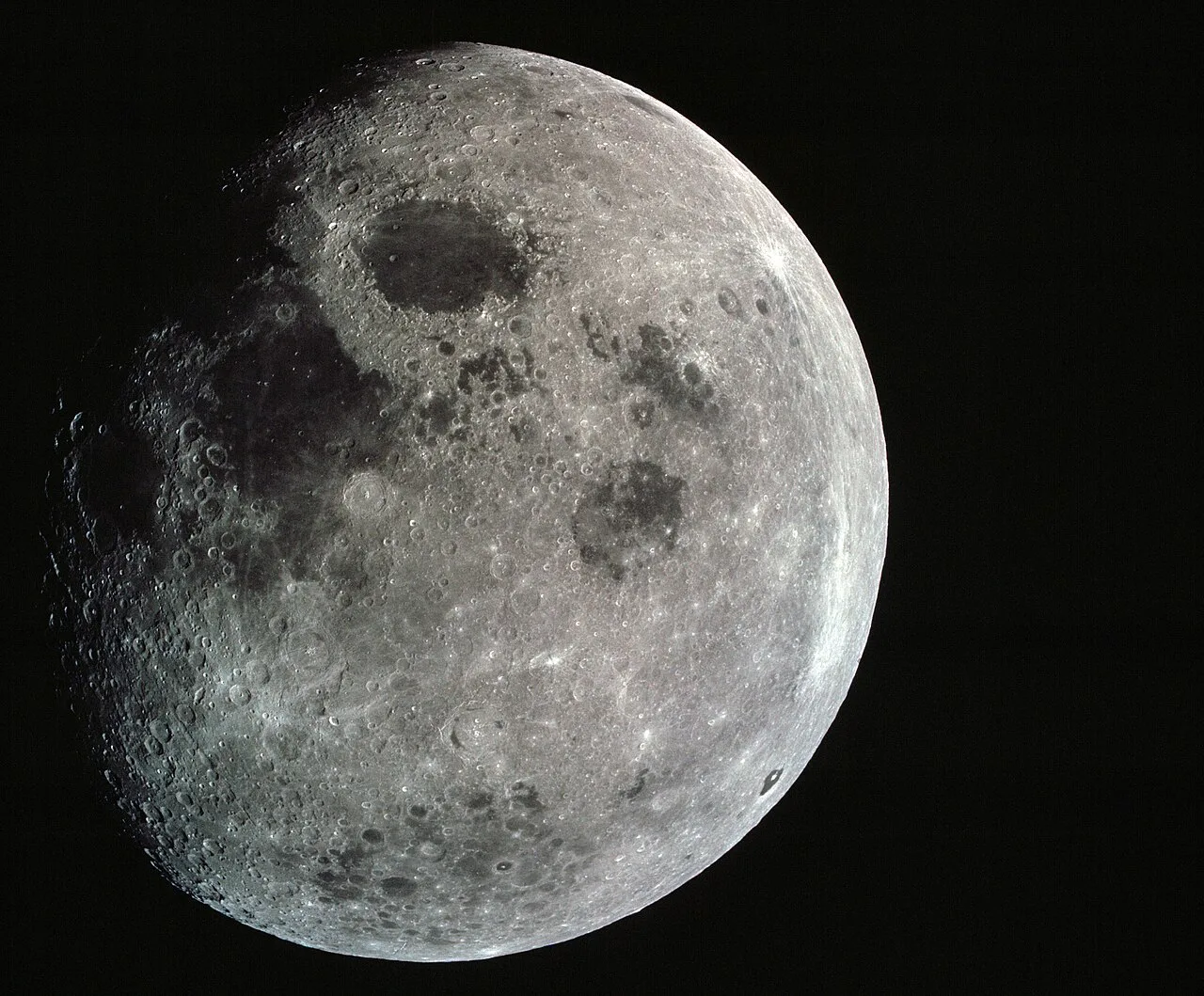 This photograph of the Moon was taken from Apollo 8 at a point above 70 degrees east longitude.