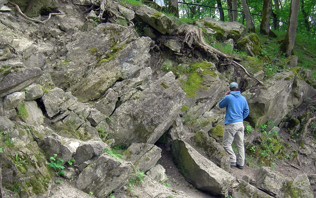 Tilted dolomite bedrock in the walls of the main crater