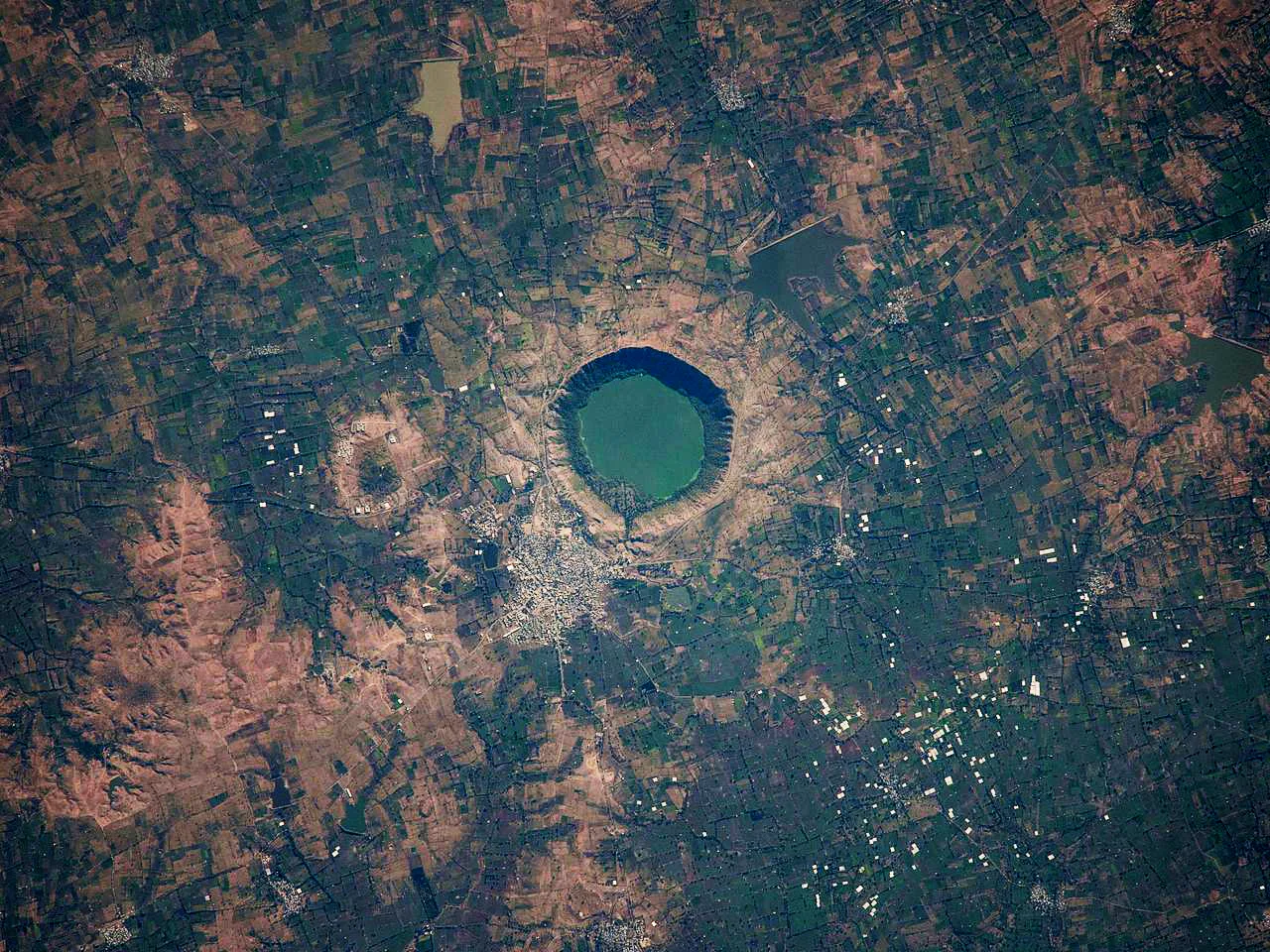 View of the crater from space (image captured by NASA satellite).
