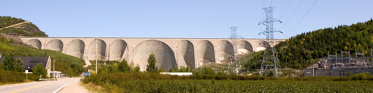 Daniel-Johnson Dam, the primary dam on the Manicouagan Reservoir, supports the Manic-5 hydro-power station