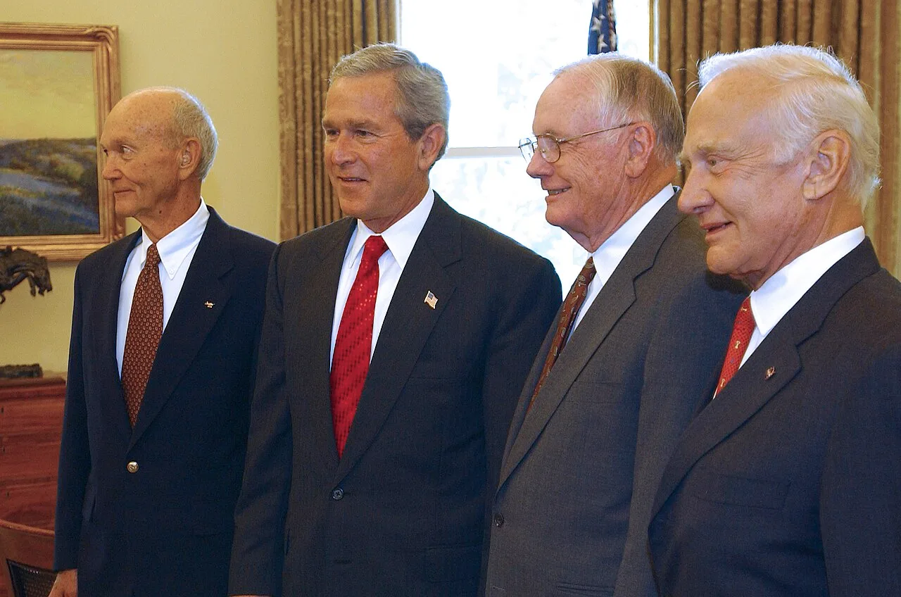Michael Collins, President George W. Bush, Neil Armstrong, and Buzz Aldrin during celebrations of the 35th anniversary o