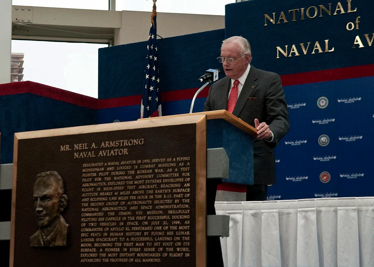 Armstrong gives an acceptance speech after being inducted into the Naval Aviation Hall of Honor at the National Naval Av