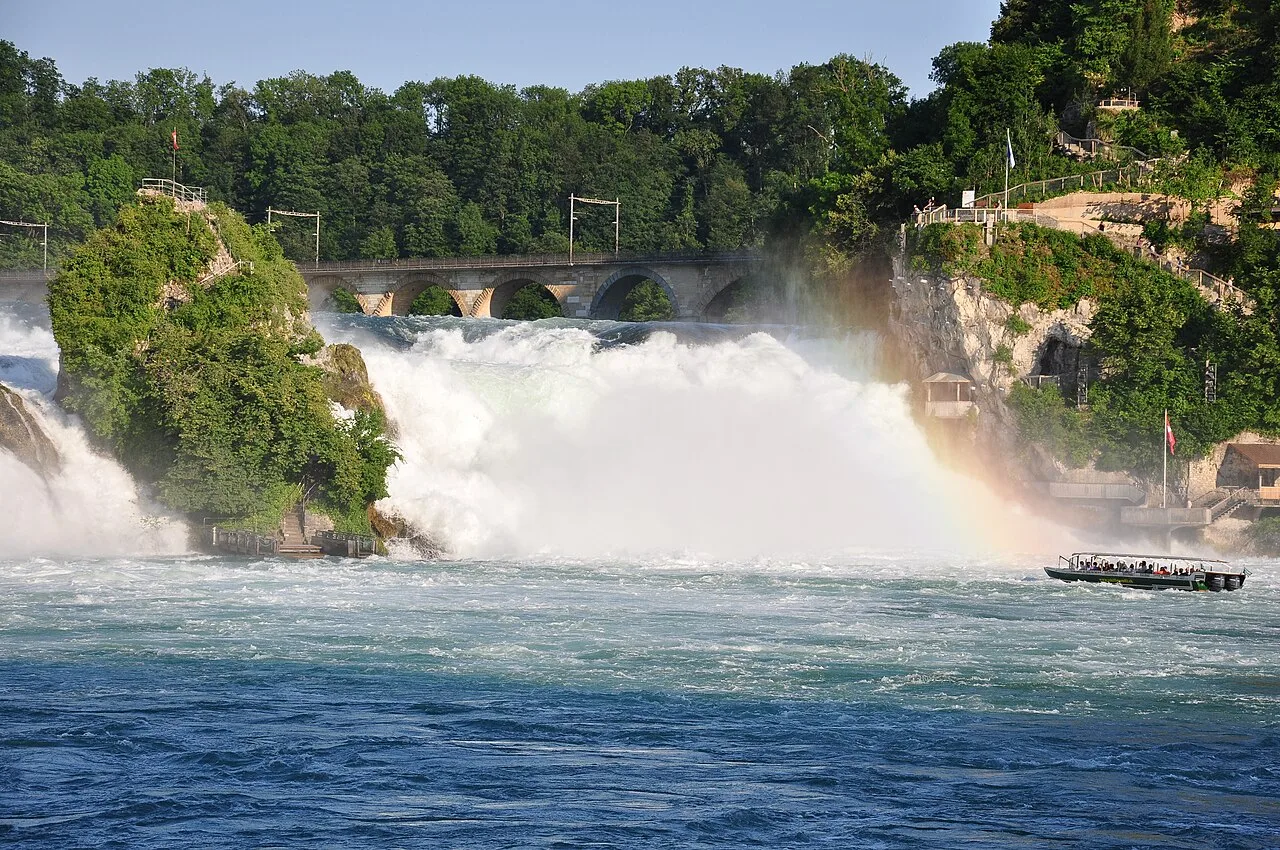 The Rhine Falls and Rheinfallfelsen seen from the Rhine
