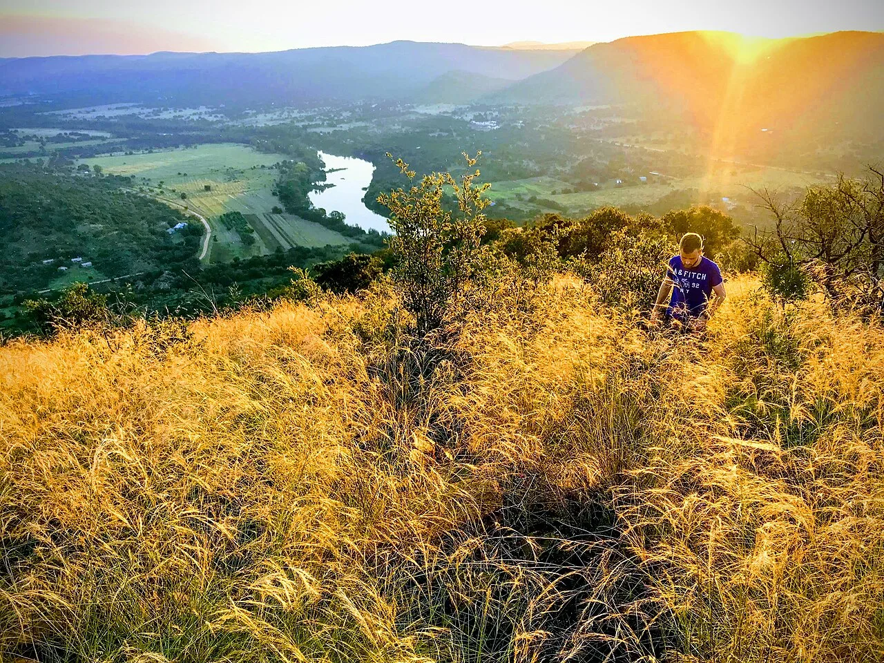 The view from the top of Aasvoëlkop in the heart of the Vredefort impact structure with the Vaal River and Venterskroon